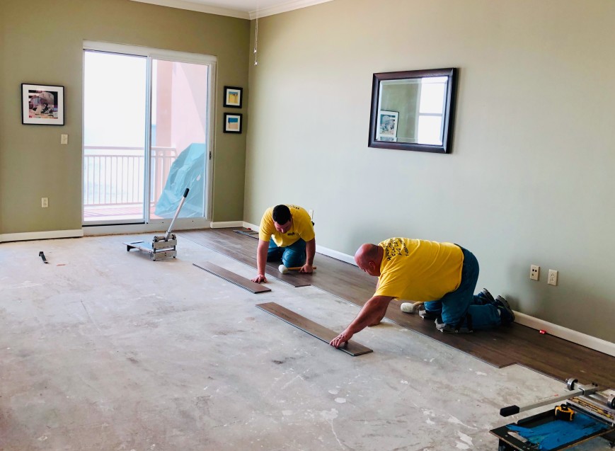 modern-business-home-renovation-men-laying-flooring-nominated_t20_8dPmBa